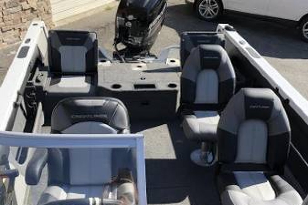 Grey and white boat interior with 4 seats