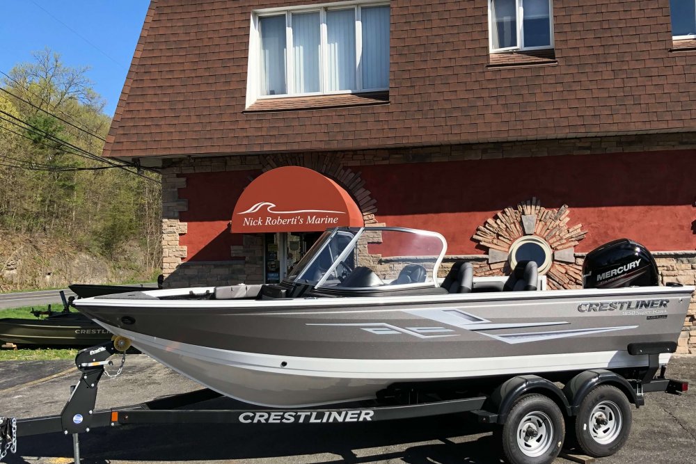 Boat on trailer in front of store