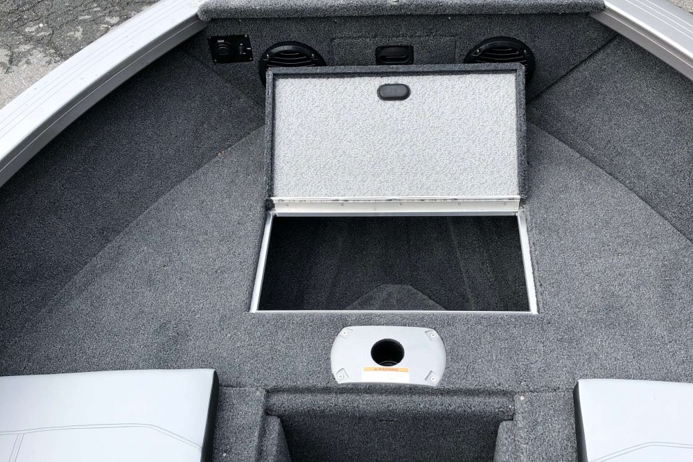 Open storage area under bow of boat