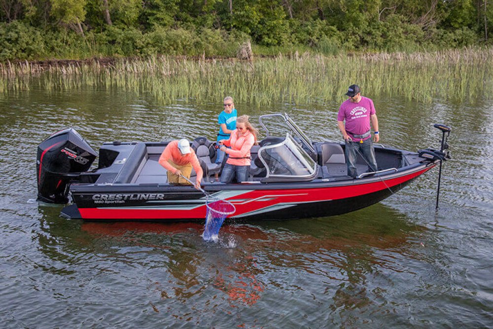 People in fishing boat on the water